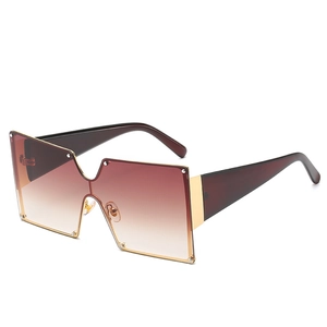 Oversized square gradient sunglasses with gold rivets and polished metal hinges
