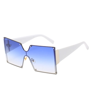 Oversized square shield sunglasses with blue gradient lenses and wide white temples