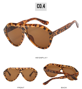 Three-angle views of large tortoise shell sunglasses with dark brown lenses and flat top