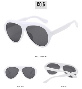Three-angle display of white wide-frame pilot sunglasses with dark grey lenses