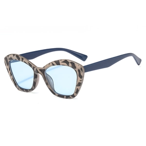 Fashionable cat eye sunglasses with leopard print frame and light blue lenses for women