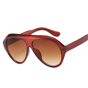 Fashionable oversized aviator sunglasses with dark red frame and gradient brown lenses