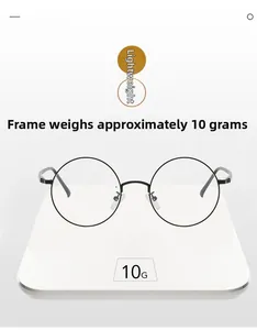 Détail d'une monture ronde vintage sur balance pesant environ 10 grammes seulement