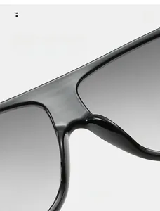 Vue macro des plaquettes de nez confortables sur lunettes de soleil noires sans traces