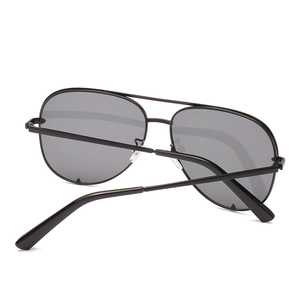 Classic aviator sunglasses with black metal double bridge frame and dark lenses