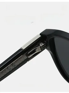 Macro shot of high-quality metal hinges on black propionate aviator sunglasses