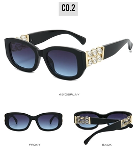 Drei-Winkel-Ansicht der schwarzen Katzenaugen-Sonnenbrille mit Verlaufsgläsern und Perlenbügeln