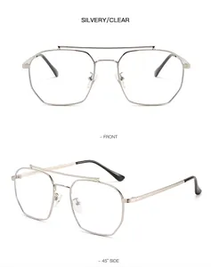 Detail view of silver double-bridge polygon sunglasses with clear lenses and black tips