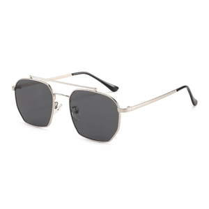 Silver metal double-bridge sunglasses with gray lenses and a modern aviator-style polygon frame
