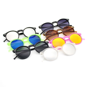 Detail view of round frame sunglasses collection with rice nail studs in various colors