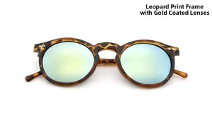 Detail of matte leopard frame sunglasses with golden mirrored lenses and round retro design