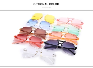 Collection of rimless geometric sunglasses featuring nine vibrant translucent color options