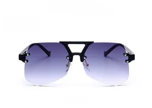 Detail of rimless gradient gray lenses with unique triangular bridge and gold rivets
