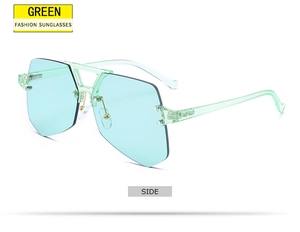 Side view of rimless light green geometric sunglasses with gold metal bridge