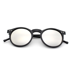 Retro round frame sunglasses with silver rivets and light mirrored lenses in black