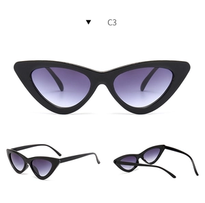 Three-angle view of vintage cat-eye sunglasses with black frames and purple gradient lenses