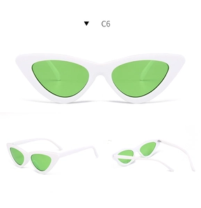 Detail view of vintage cat-eye sunglasses with white frame and green lenses from multiple angles