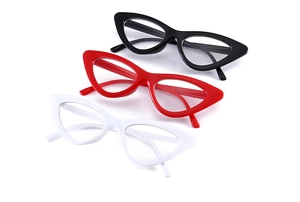 Detailed trio of cat-eye glasses in black, red, and white frames with clear lenses