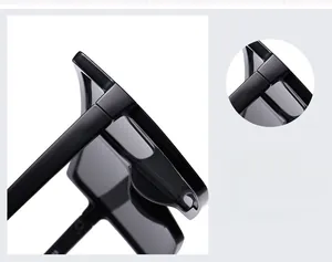 Detail view showing stylish temple design and hinge of black oversized square sunglasses