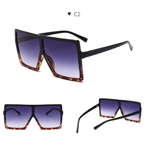Detailed three-view of large square sunglasses with purple gradient lenses and tortoiseshell frame