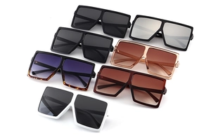 Detailed grid showing seven trendy oversized square sunglasses in various colors on white