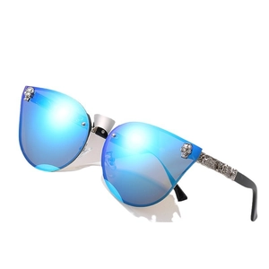 Lunettes de soleil œil-de-chat gothiques avec verres bleus et branches tête de mort