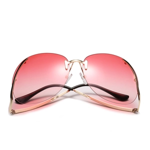 Lunettes de soleil sans monture avec verres dégradés roses et détails en métal doré