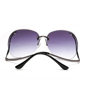 Lunettes de soleil oversize sans monture avec verres dégradés violets pour femmes