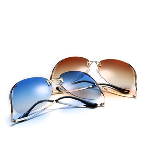 Lunettes de soleil papillon sans monture à verres dégradés bleu océan et marron