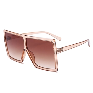 Oversized square sunglasses with transparent tea frame and gradient lenses for a stylish look