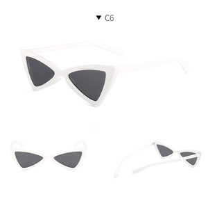Detailed views of white triangle cat eye sunglasses with dark grey lenses in C6 style