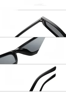 Detail of square sunglasses showing metal hinges, nose pads, and streamlined temples