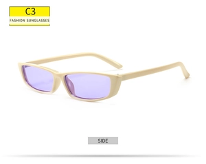 Detail view of cream rectangle sunglasses with purple lenses and fashion side temples