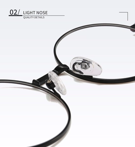 Détail macro des plaquettes de nez en silicone sur montures de lunettes rondes noires