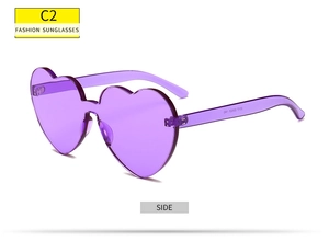 Vue latérale de lunettes de soleil sans monture en forme de cœur violet transparent