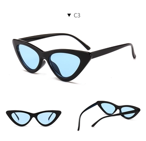 Detailed multi-angle views of vintage cat eye sunglasses with blue lenses and black frames