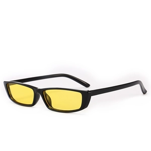 Trendy small rectangular sunglasses with black glossy frames and retro yellow lenses