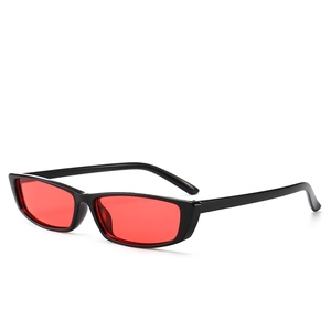 Retro rectangle sunglasses with black frame and vibrant red lenses in a y2k fashion style