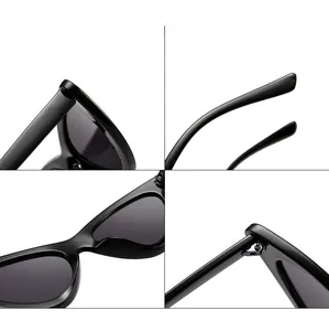 Macro details of retro cat-eye sunglasses featuring metal hinges and glossy black frames