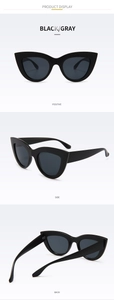 Three-view perspective of vintage cat eye sunglasses in black frame and gray lenses