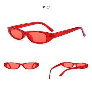 Detail view of red small oval sunglasses showing semi-transparent resin frame and C4 color code