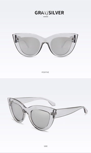 Front and side view of retro gray cat eye sunglasses with silver mirrored lenses