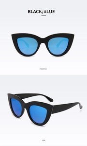 Close-up of black cat eye sunglasses with blue mirrored lenses showing front and side views
