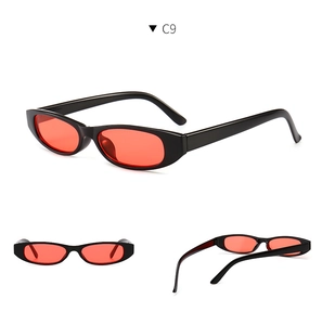 Three-way view of retro small oval sunglasses with black frames and red tinted lenses