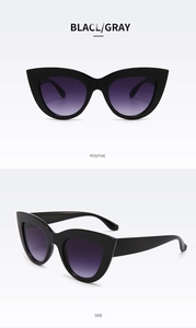 Front and side views of vintage cat eye sunglasses with thick black frames and grey lenses
