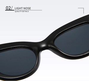 Detail view of the lightweight matte black cat-eye sunglasses nose bridge design