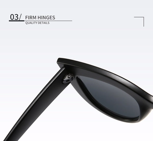 Detail view of durable firm metal hinges on matte black cat eye sunglasses