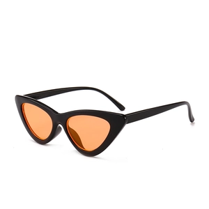 Retro black triangular cat eye sunglasses with orange lenses shown at a 45-degree angle