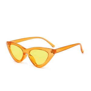 Trendy cat-eye sunglasses with translucent orange frame and vivid yellow lenses