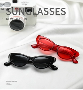 Detailed view of cat eye sunglasses with UV protection on white silk background